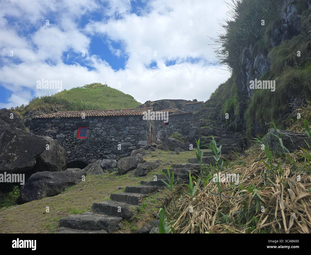 Ruins of the Viola watermills along a walking trail in São Miguel Island, Azores, Portugal. - Smartphone Captured Stock Image