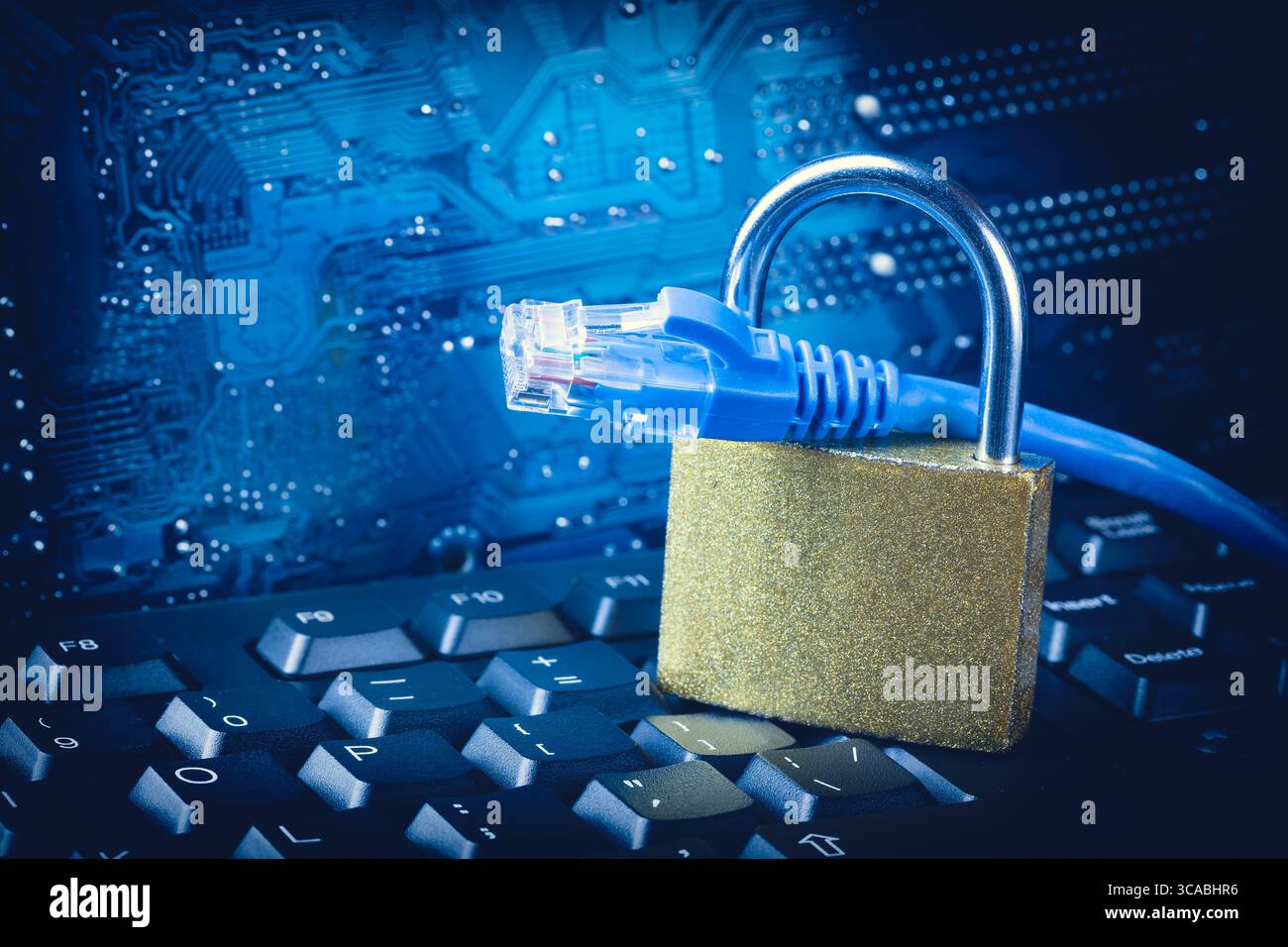 Padlock with ethernet network cables close up. Internet data privacy ...