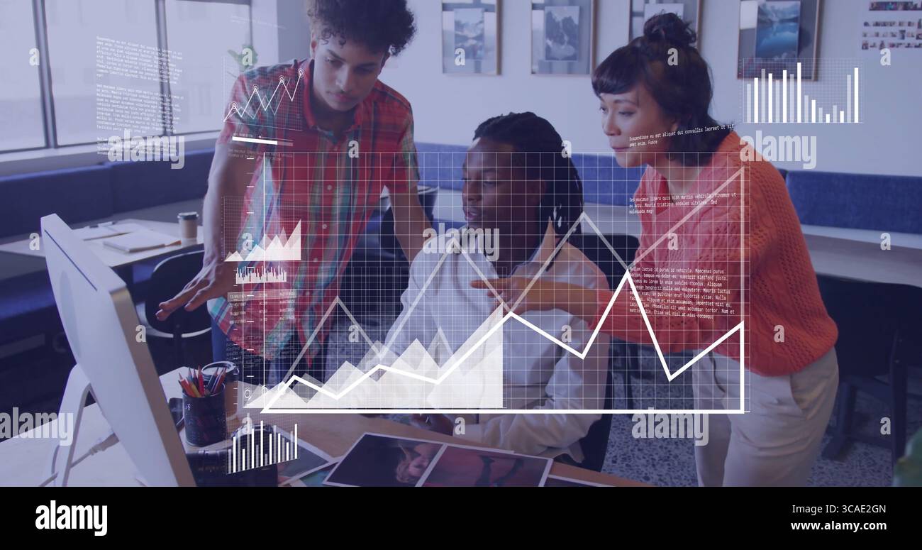 Collaborating coworkers wearing business attire analyzing data at ...