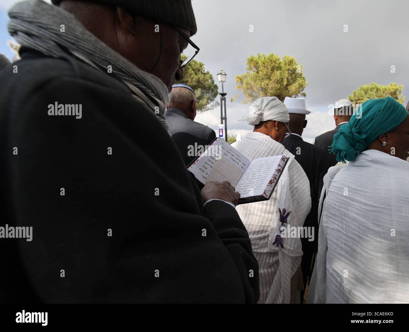 People pray as the Ethiopian Jewish holiday of Sigd is celebrated at the Tayelet Haas Promenade in Jerusalem on Nov. 28, 2024. Stock Photo