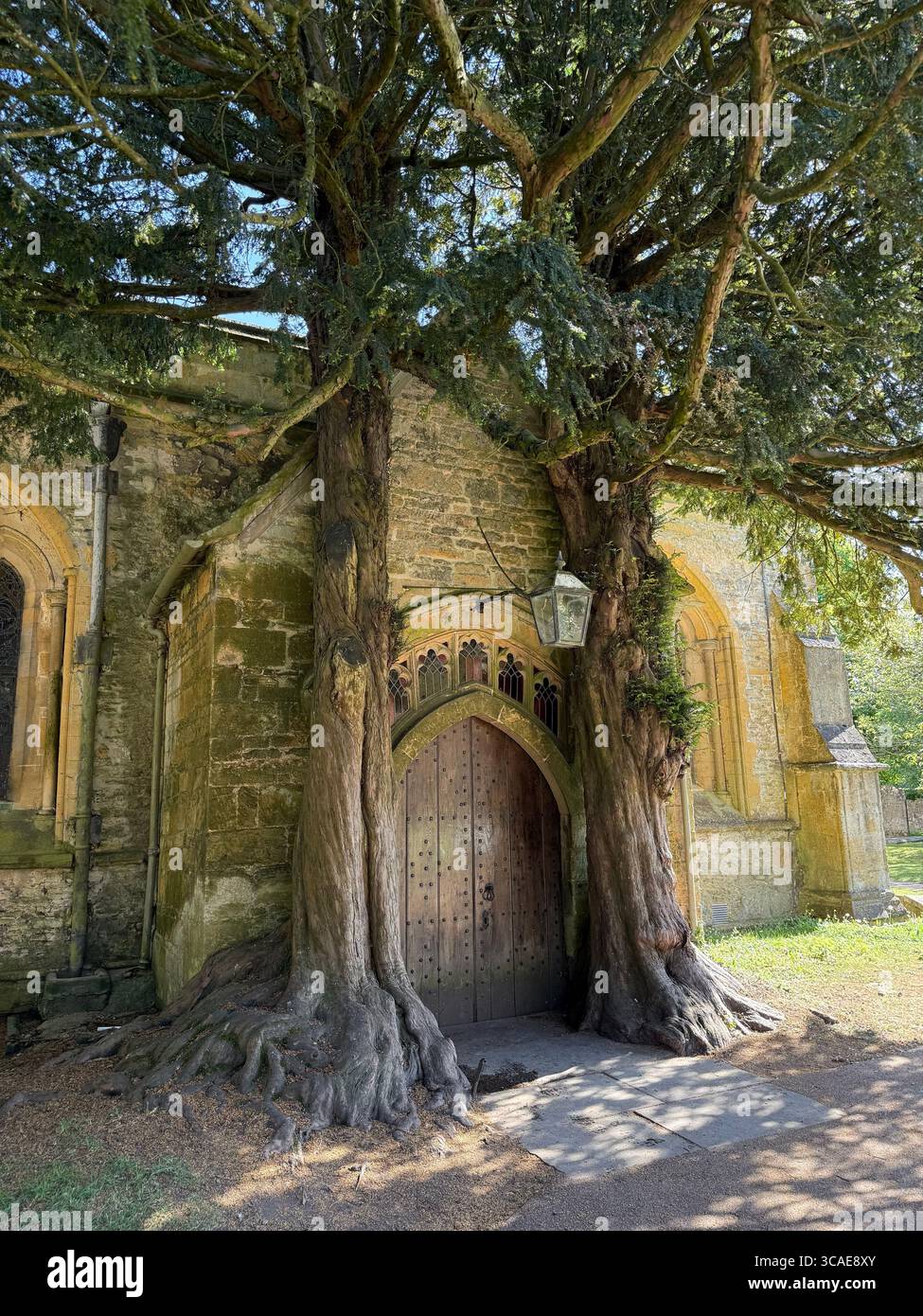 St. Edward’s Church in Stow-on-the-Wold, a historic Cotswolds gem dating back to the Middle Ages, famous for its magical yew-framed doorway. - Smartphone Captured Stock Image