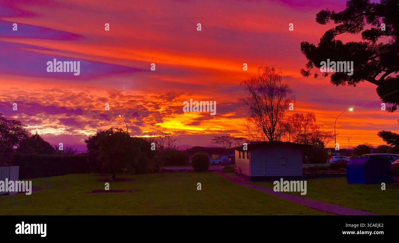Red Sunset Skies in Stoke New Zealand Late Cool Winter Evening - Smartphone Captured Stock Image
