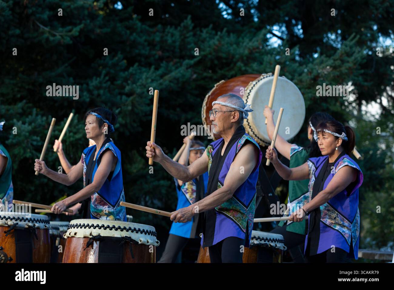 Members of Seattle Kokon Taiko perform during the Toro Nagashi Lantern Floating Ceremony at Green Lake in Seattle on Wednesday, August 6, 2025. The an Stock Photo