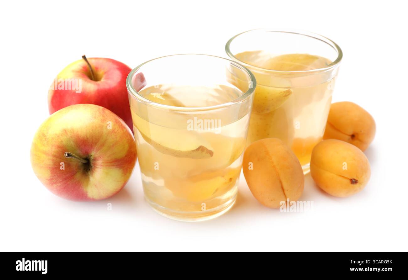 Tasty compot and fruits isolated on white Stock Photo - Alamy