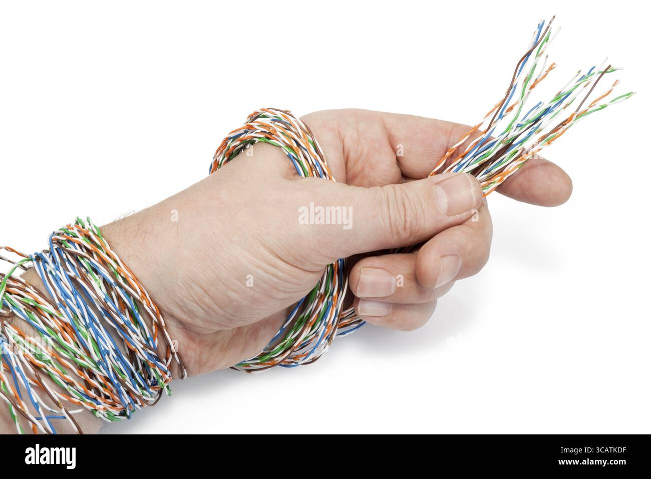 Technician has prepared a computer internet twisted pair cable for connection. Isolated on white Stock Photo
