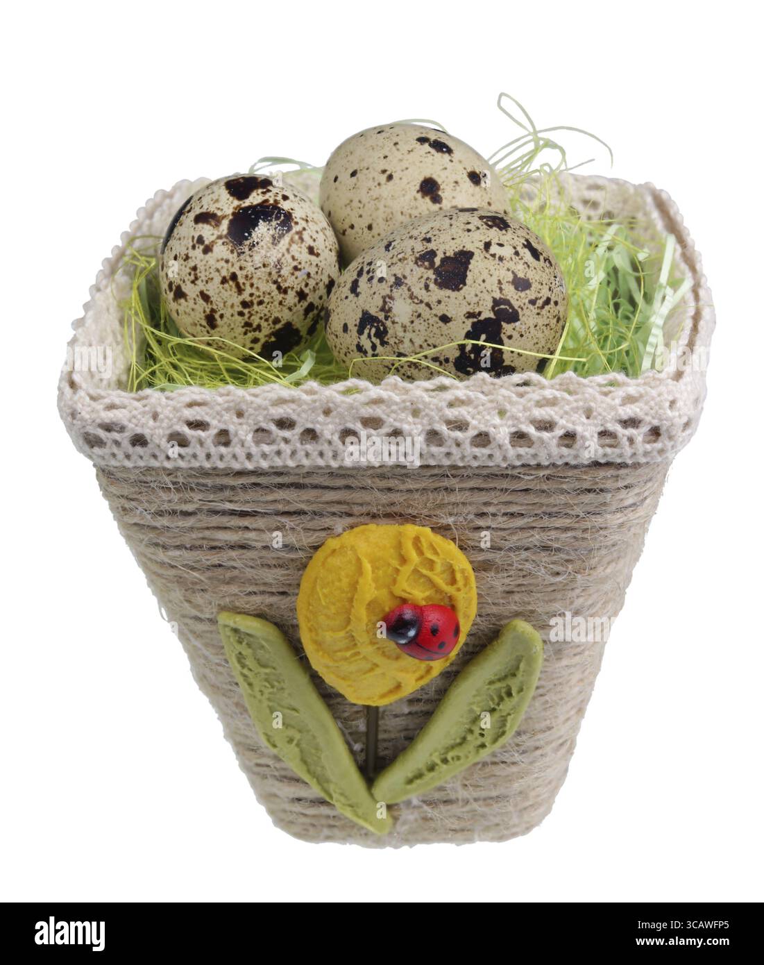 Easter handmade nest from rope with quail egg. Isolated on white studio macro shot Stock Photo