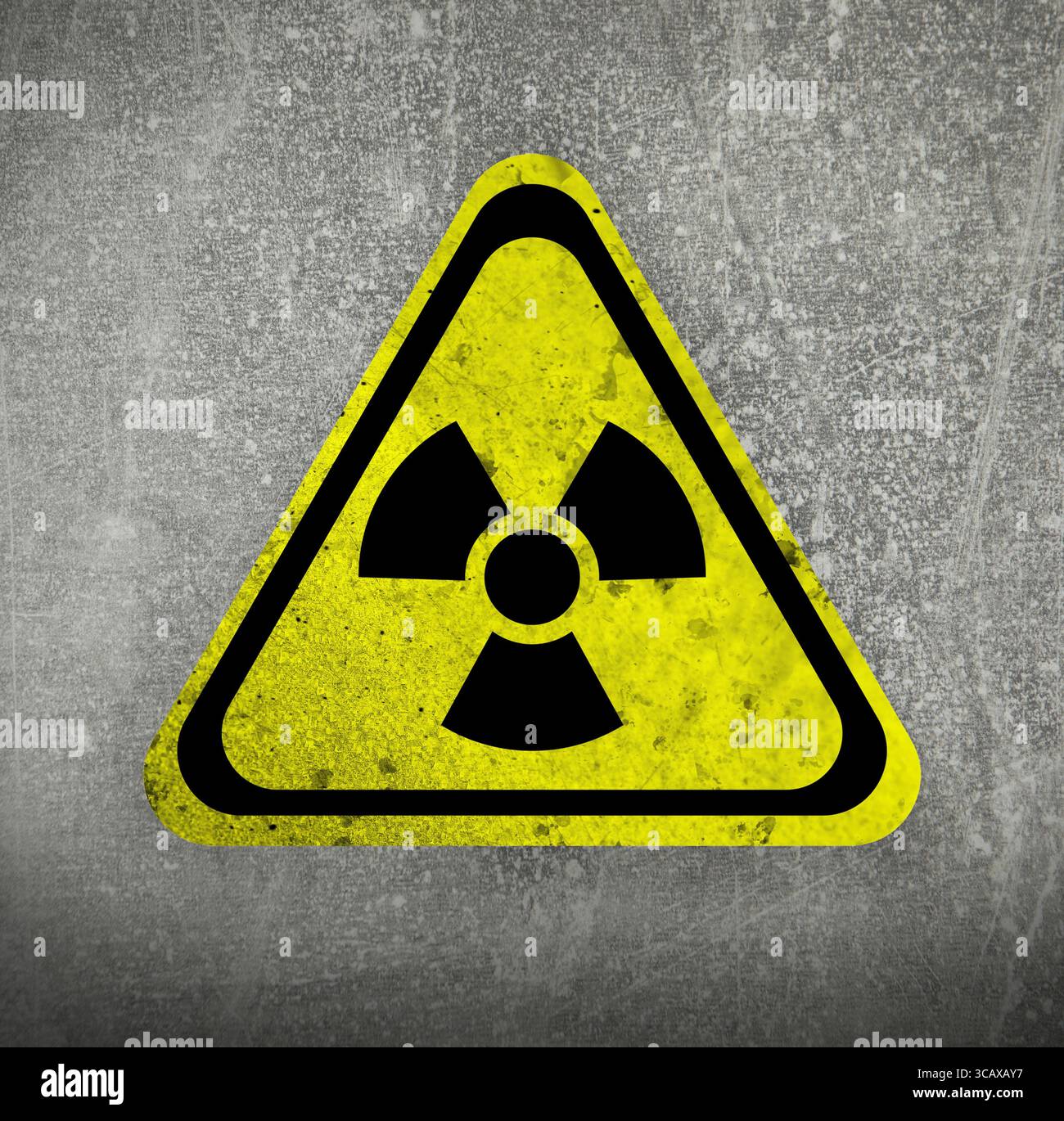 Radioactive sign on grey textured surface. Radiological pollution Stock Photo