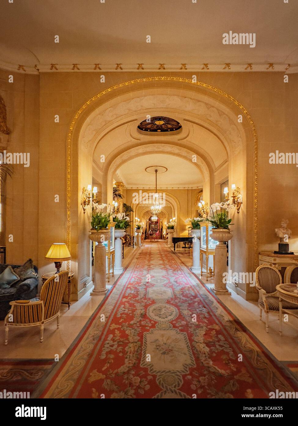 The beautiful Long Gallery corridor with its arches and chandeliers, an ...