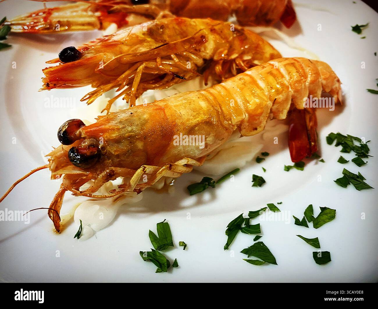 Prawns in a restaurant in El Palmar beach in Vejer de la Frontera, Cadiz, Andalusia, Spain - Smartphone Captured Stock Image
