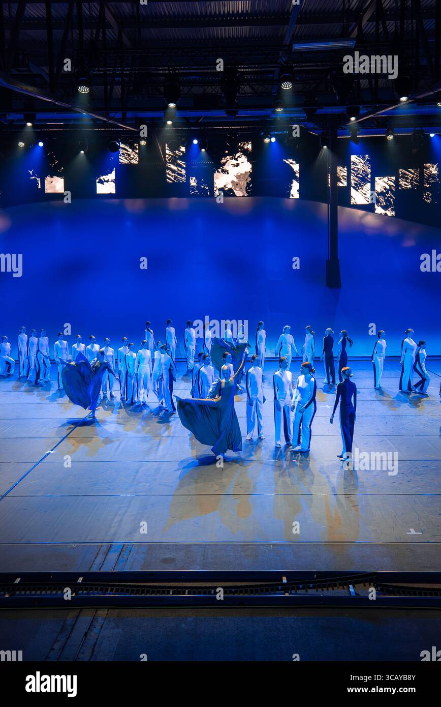 Group Dance Performance on Stage with Blue and White Costumes Stock ...