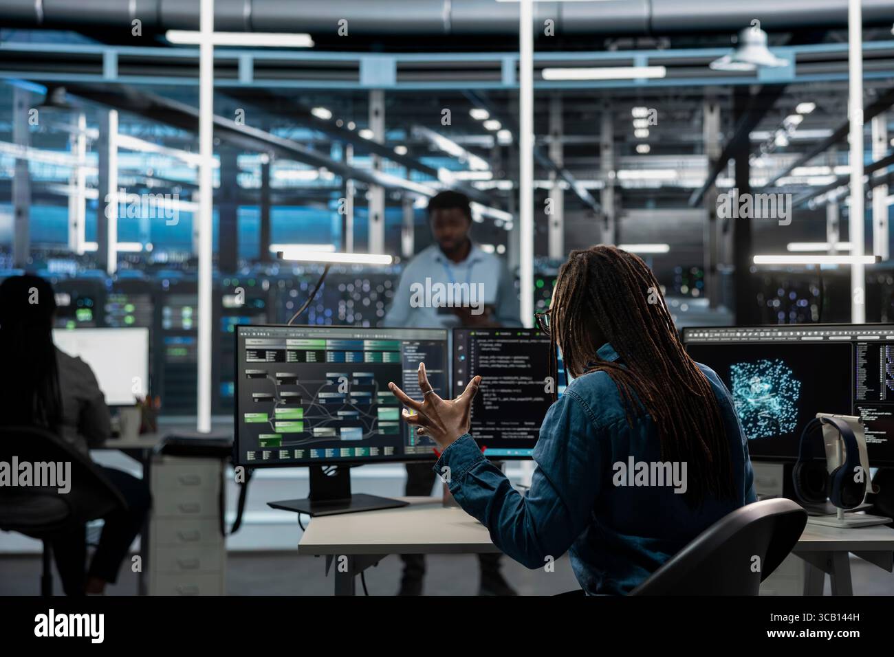 Data center admin raging, upset by errors while using AI visualization to oversee automated tasks. Mad server hub expert annoyed by glitches while modifying systems based on data analytics graphs Stock Photo