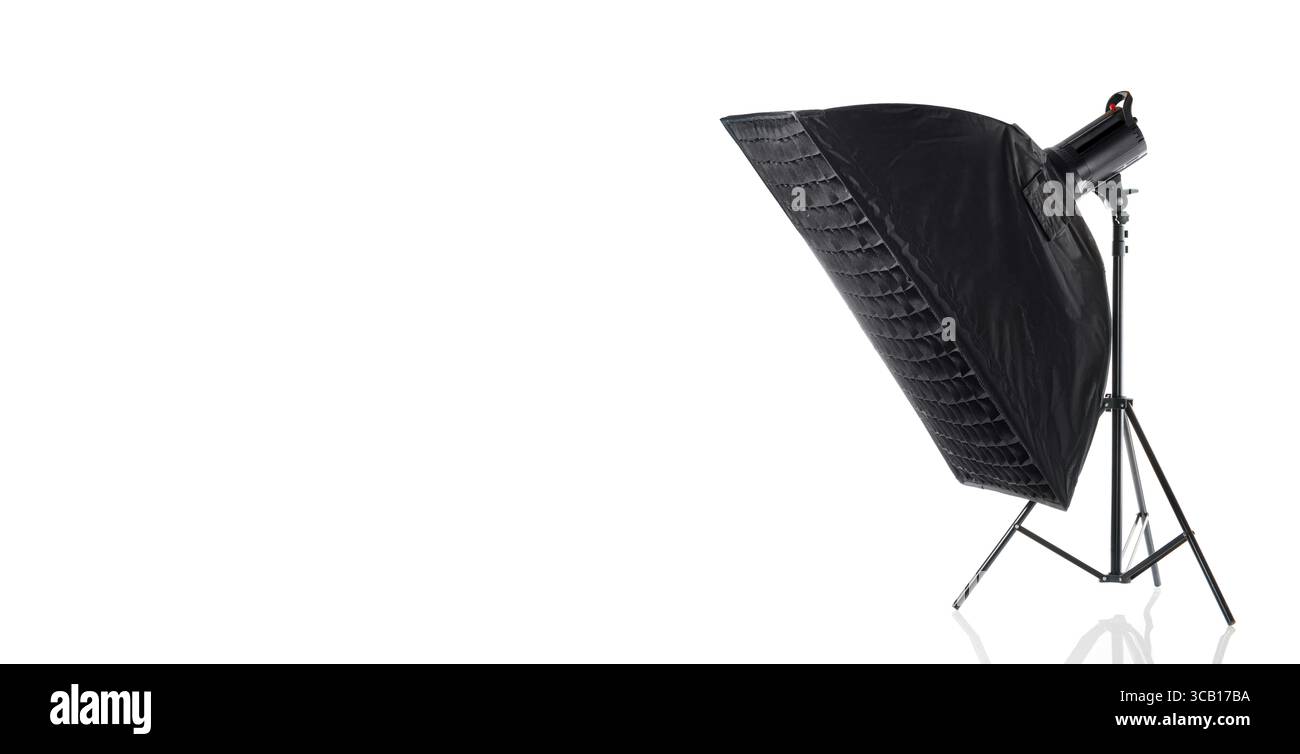 Studio lighting equipment. Grid softbox isolated on white background. Free space Stock Photo