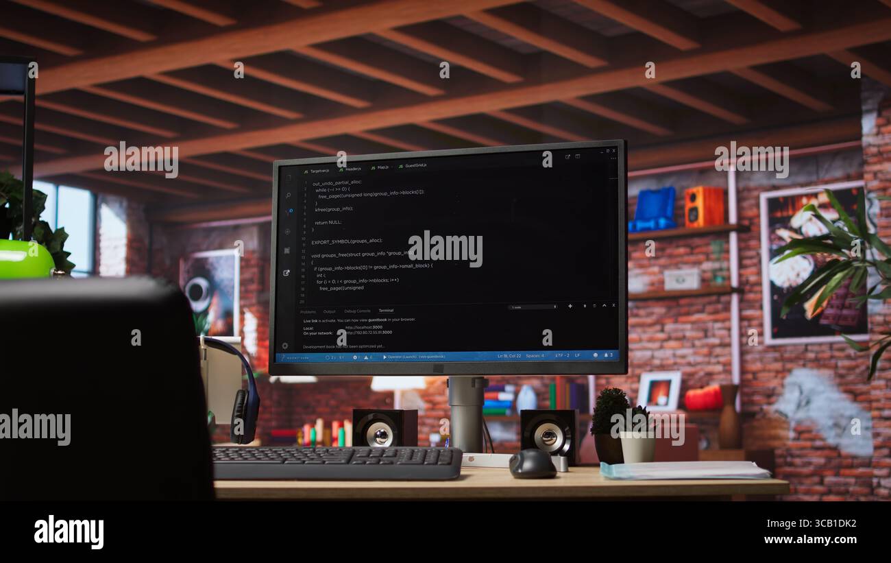 Programming language code editor software displayed on PC screen in home workspace, illustrating technology driven collaboration and highlighting lines of code powering diverse digital solutions Stock Photo