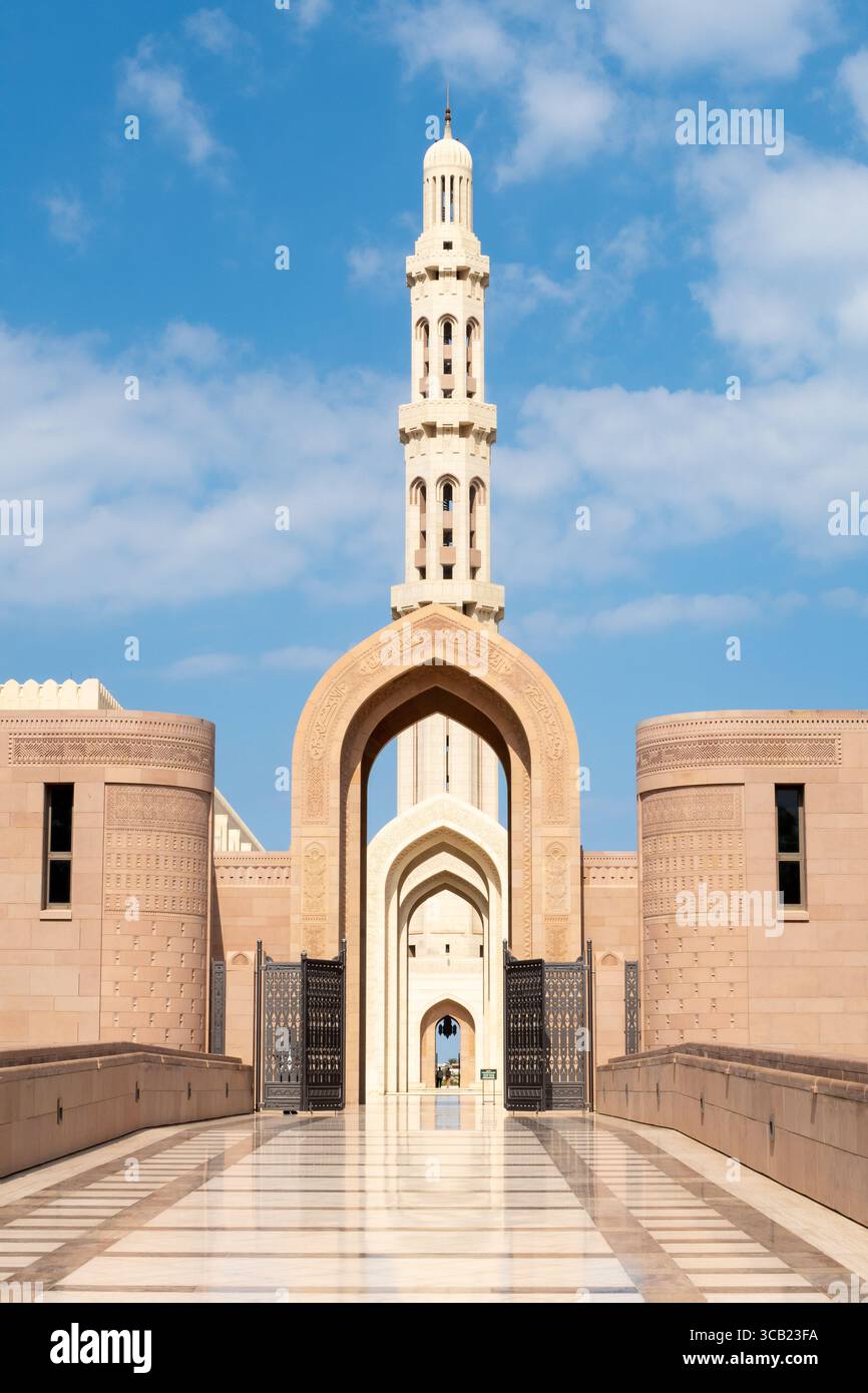 Entrance to Sultan Qaboos Grand Mosque in Muscat, Oman. On the walls Quran scriptures are written. Stock Photo