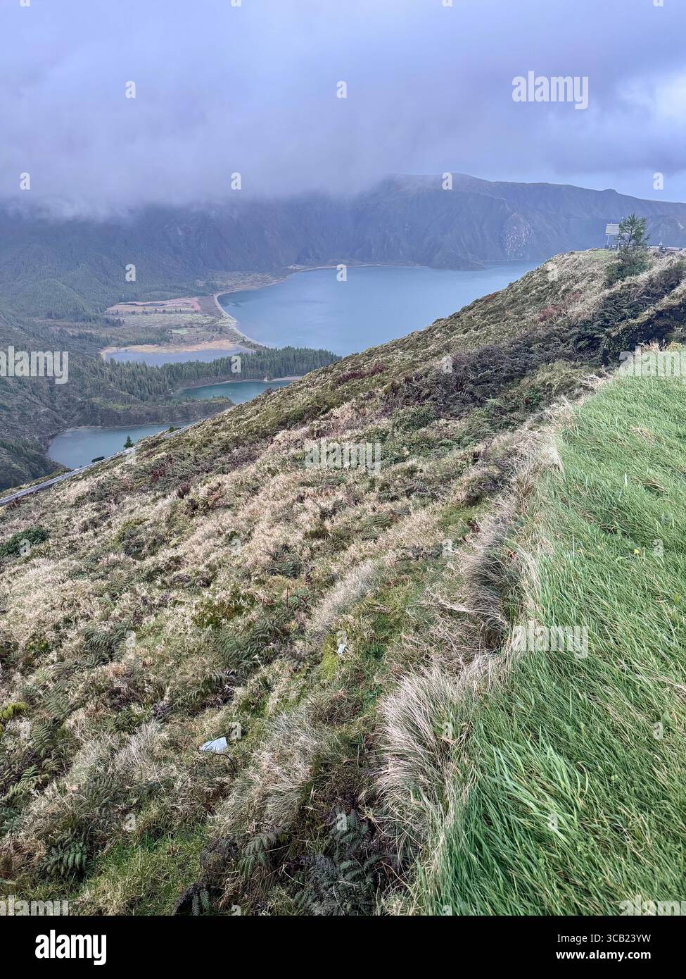 Cloudy view over Lagoa do Fogo, a volcanic crater lake and protected natural reserve in São Miguel, Azores. - Smartphone Captured Stock Image