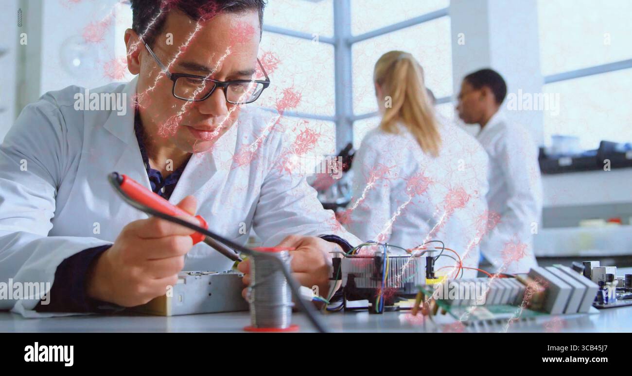 Soldering man in white coat using soldering iron on circuit board at lab bench, with microscope Stock Photo