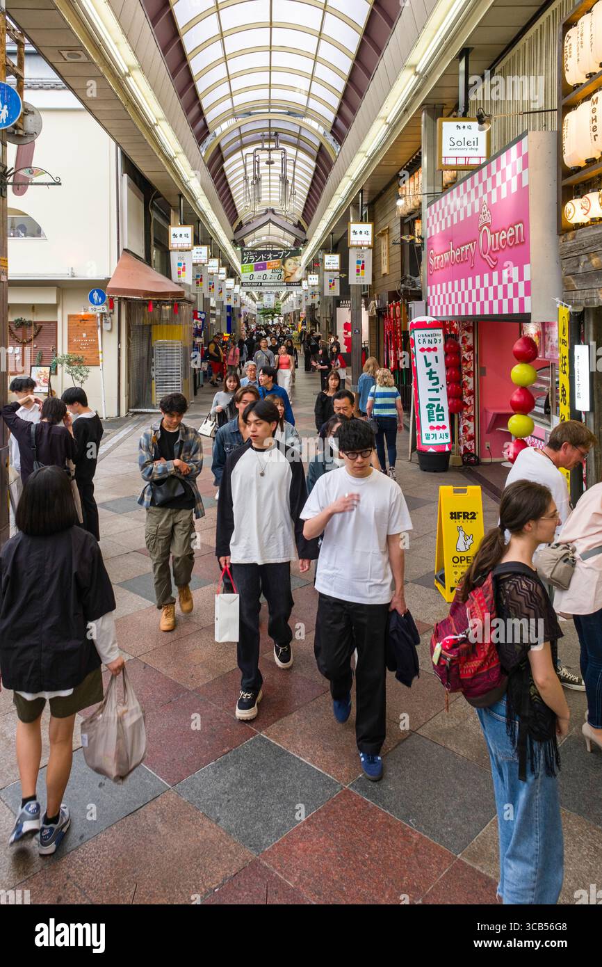 Bustling street scene inside hi-res stock photography and images - Alamy