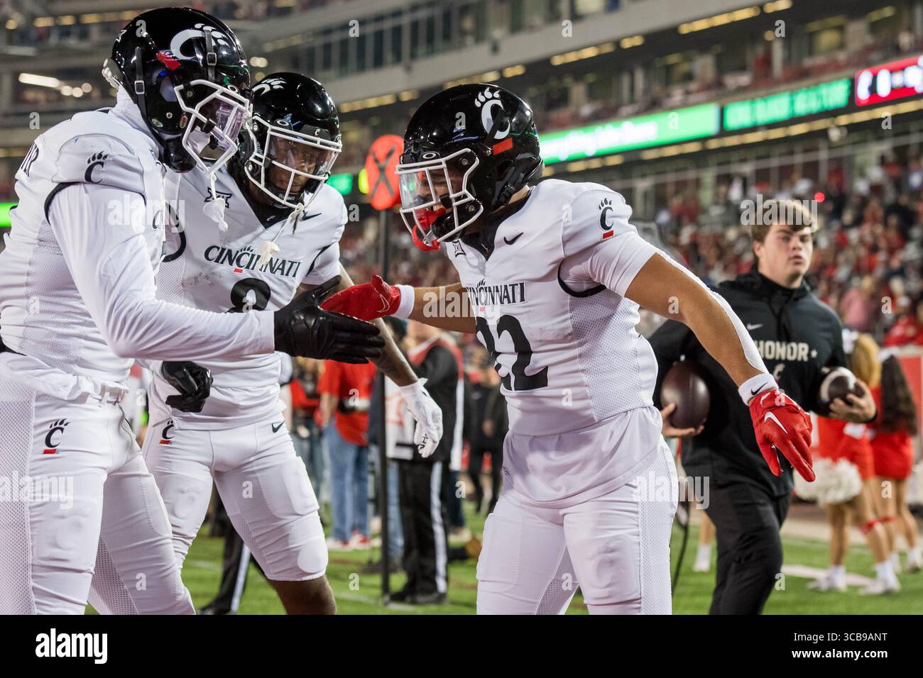 Cincinnati wide receiver Xzavier Henderson (8) gestures during an