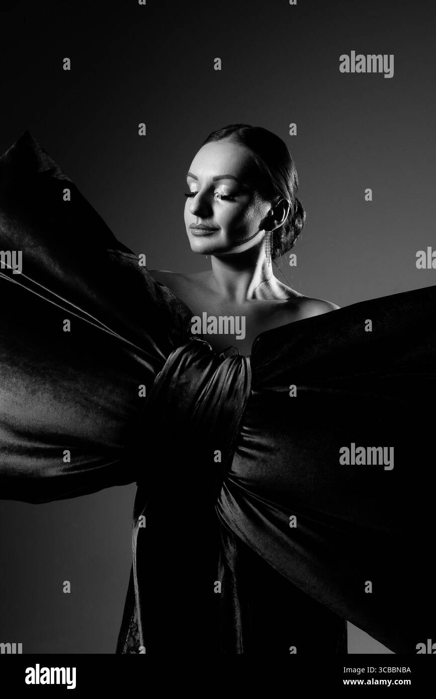 Serene woman in stylish Black and White Stock Photos & Images - Alamy
