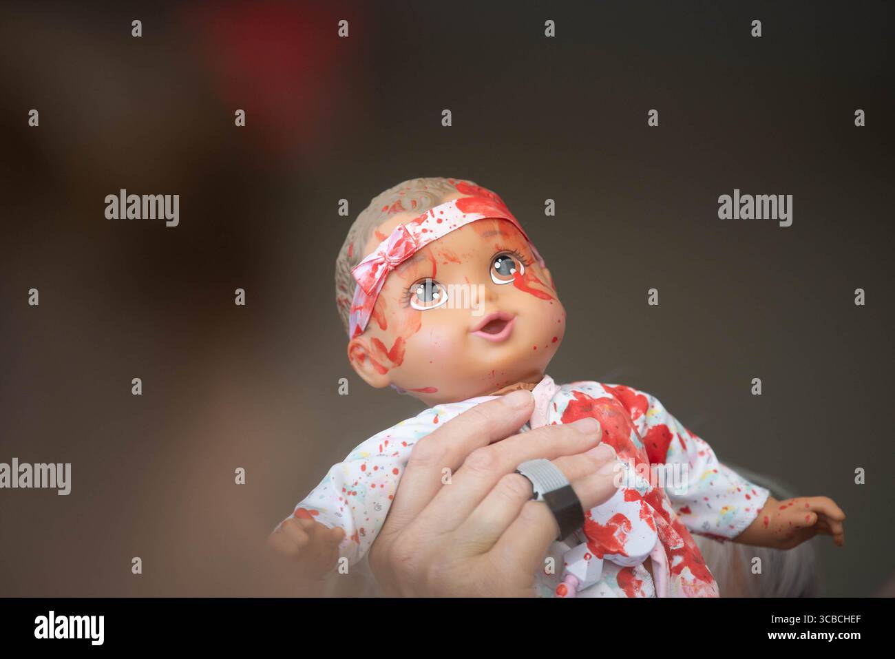 November 16, 2023, Washington, District of Columbia, USA: A doll covered in fake blood is held up while CODEPINK protesters gather with pro-palestinian protesters calling for a ceasefire in Gaza in the Hart Senate office building on Thursday, November 16, 2023  (Credit Image: © Annabelle Gordon/CNP via ZUMA Press Wire) Stock Photo