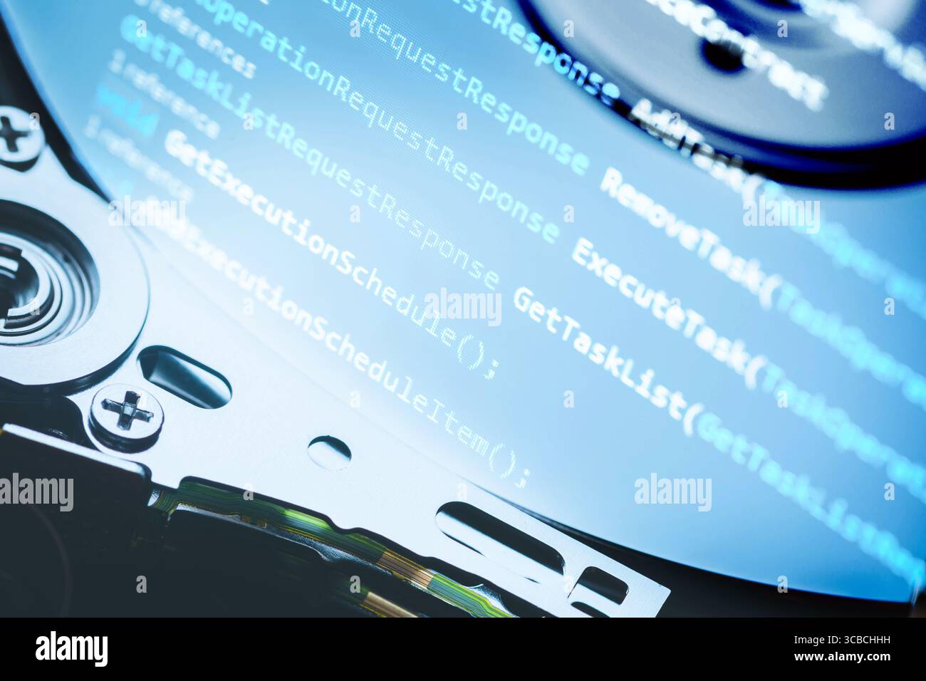 Information technology concept. Coding programmer language script text on hard disk drive. Programmer occupation job Stock Photo