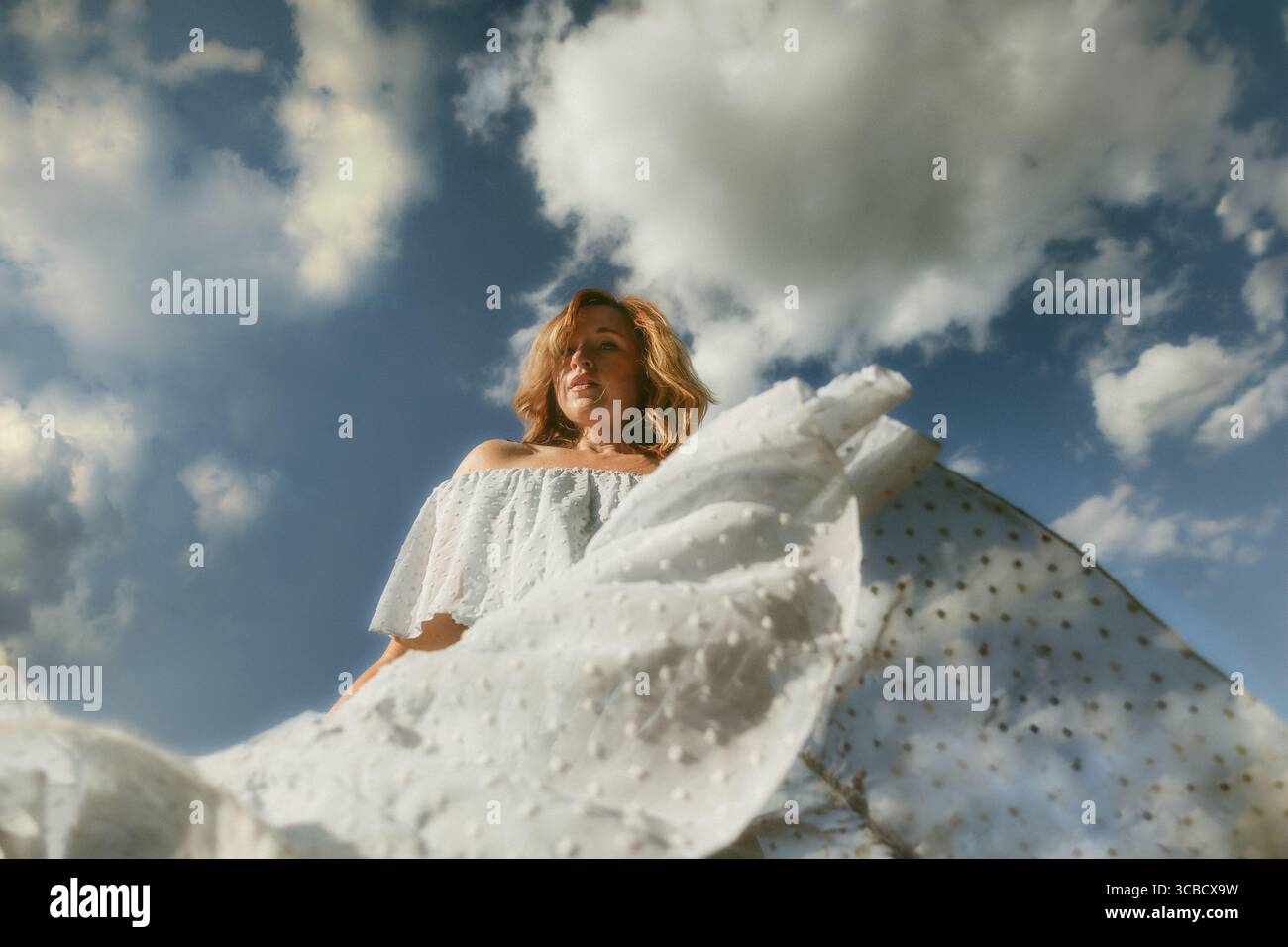 Woman flowy dress hi-res stock photography and images - Alamy