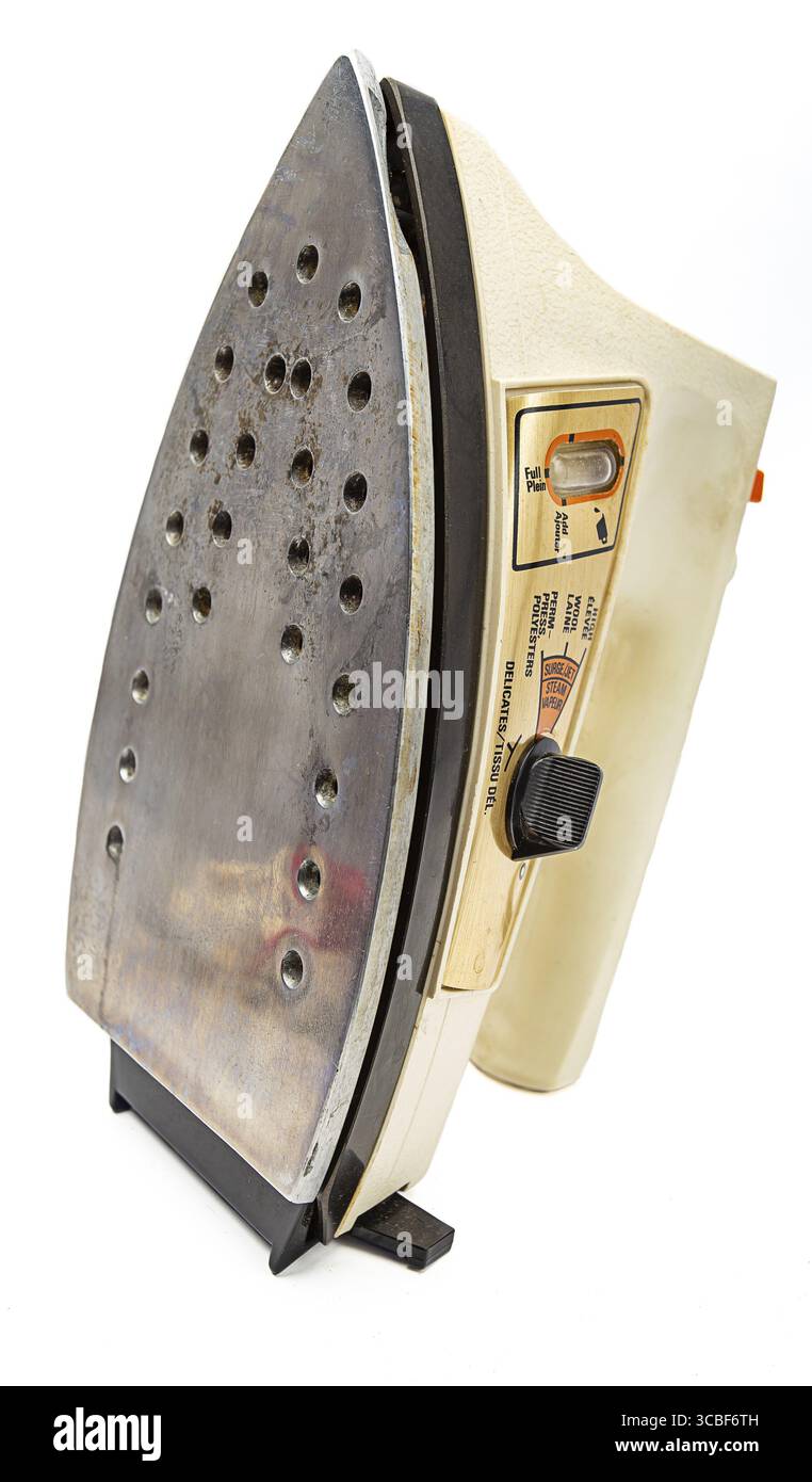Old electric iron isolated on a white background Stock Photo