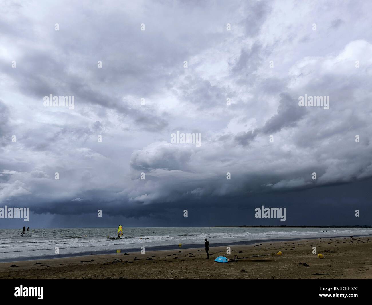 Windsurfers on the beach at Hauteville-sur-Mer, Normandy. 20 July 2025 Photo Damien Grenon credit:Photo12/Damien Grenon Stock Photo