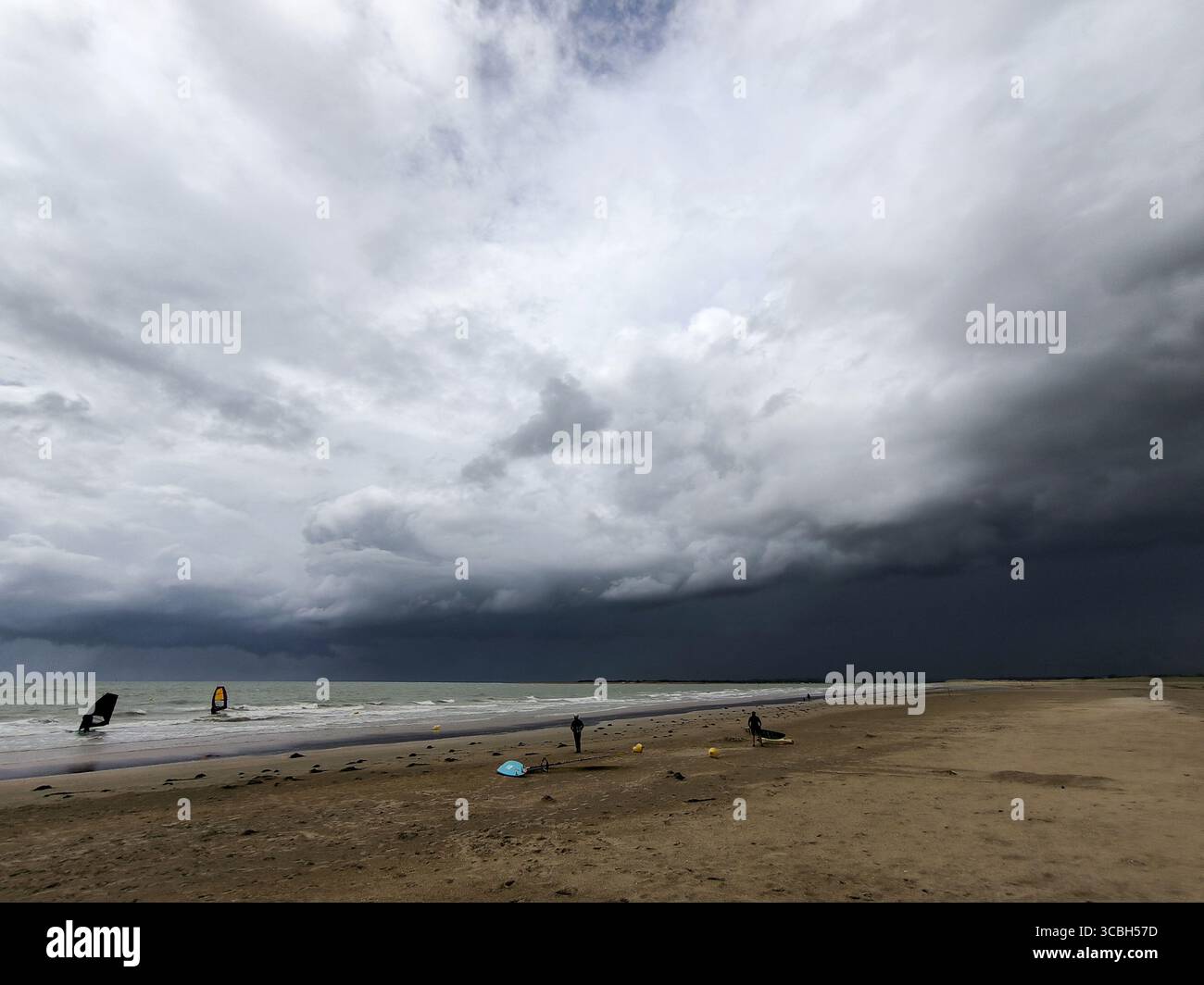 Windsurfers on the beach at Hauteville-sur-Mer, Normandy. 20 July 2025 Photo Damien Grenon credit:Photo12/Damien Grenon Stock Photo