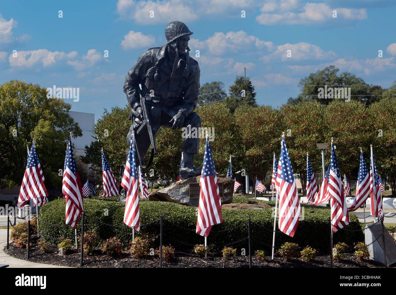 The Iron Mike statue in Fayetteville, NC, honors paratroopers and airborne forces, symbolizing courage, strength, and dedication to service. Stock Photo