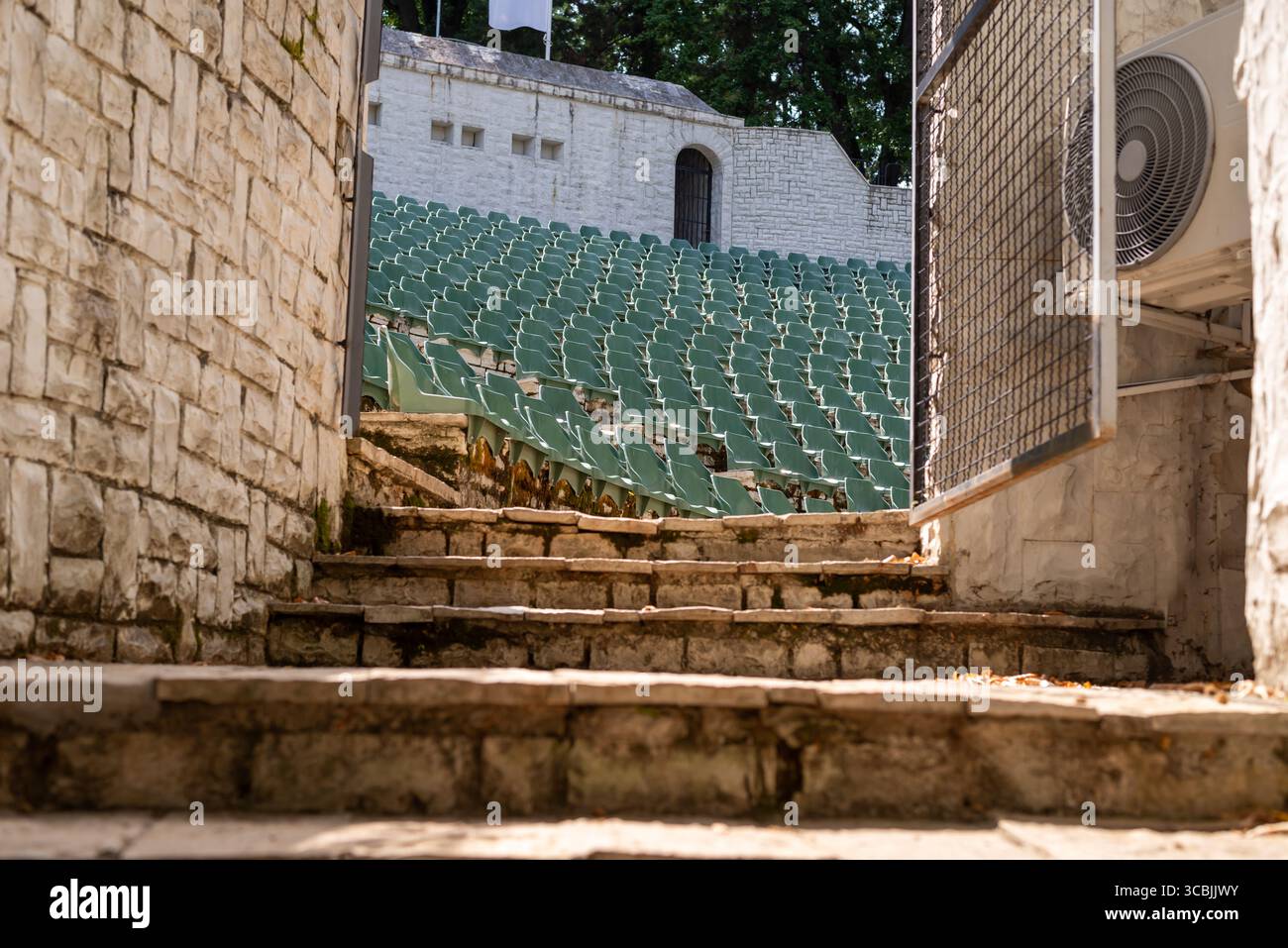Stone steps and gate leading to an open-air amphitheater Stock Photo ...