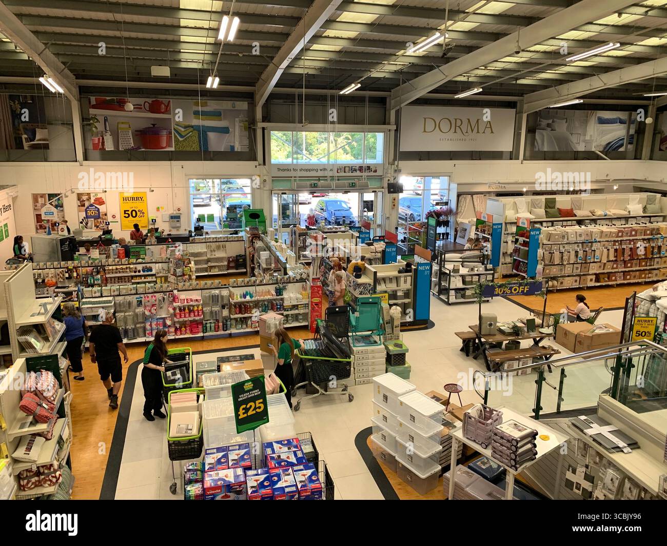 Dunelm Northampton shop shopping Cafe food drink eating table tables chair chairs goods clothes ornaments ornament lifestyle sign big shoppers shopper - Smartphone Captured Stock Image