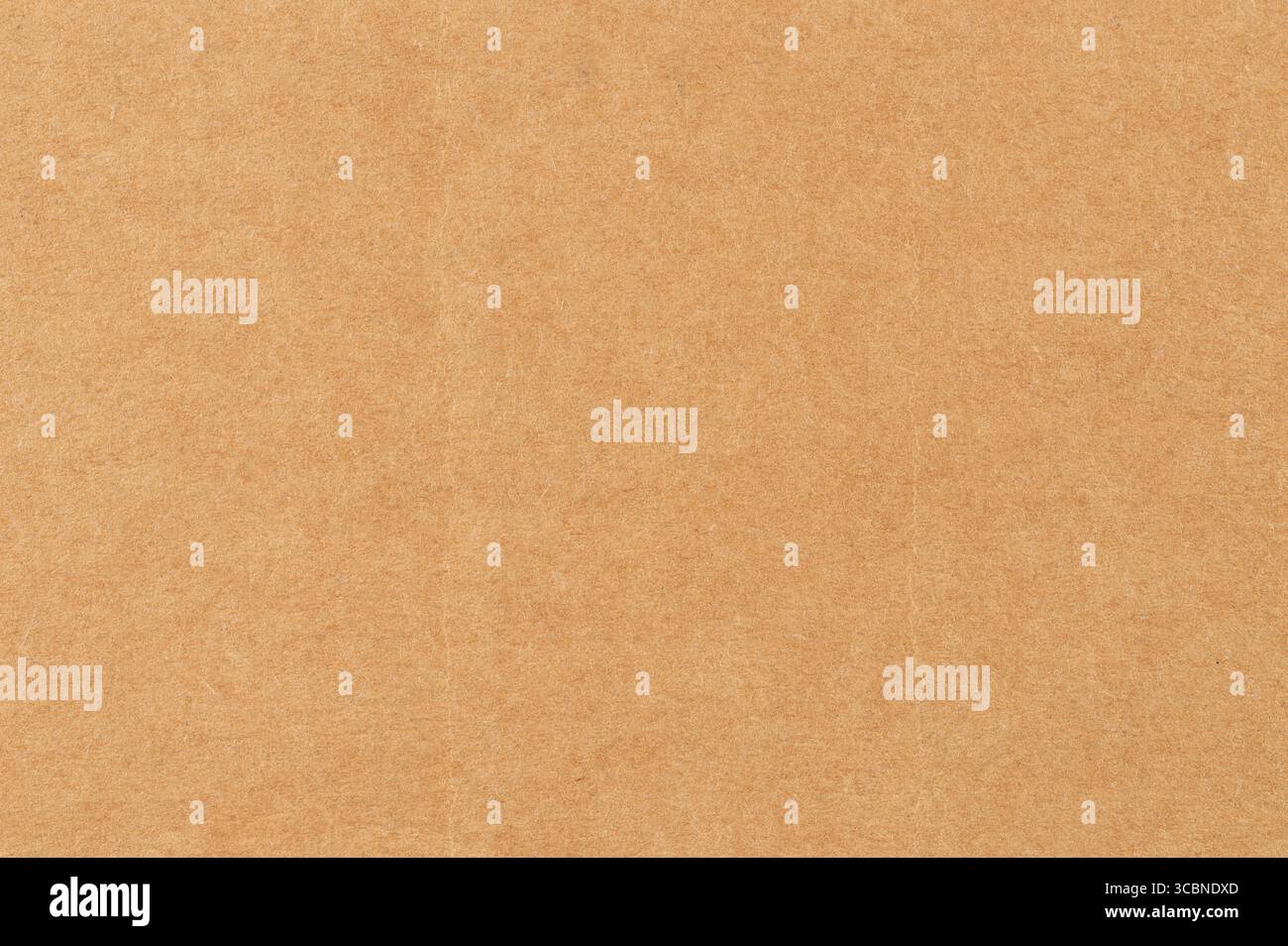 Texture features smooth brown craft paper surface ideal for arts, crafts, and design projects, enhancing creative expression. Stock Photo