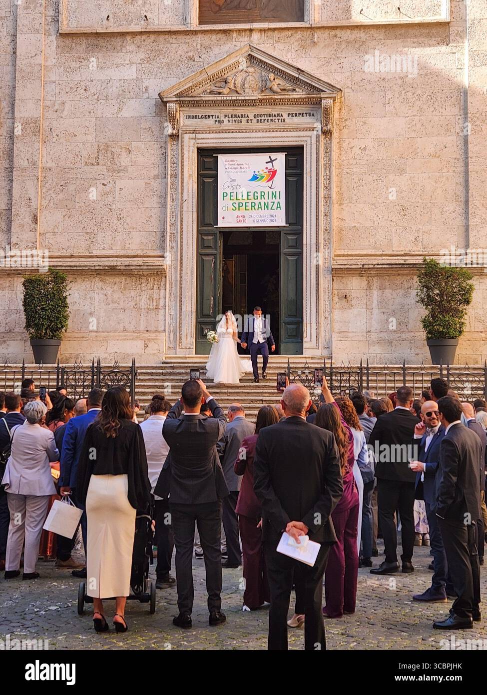 couple get married at the Basilica of Saint Augustine in rome Stock Photo