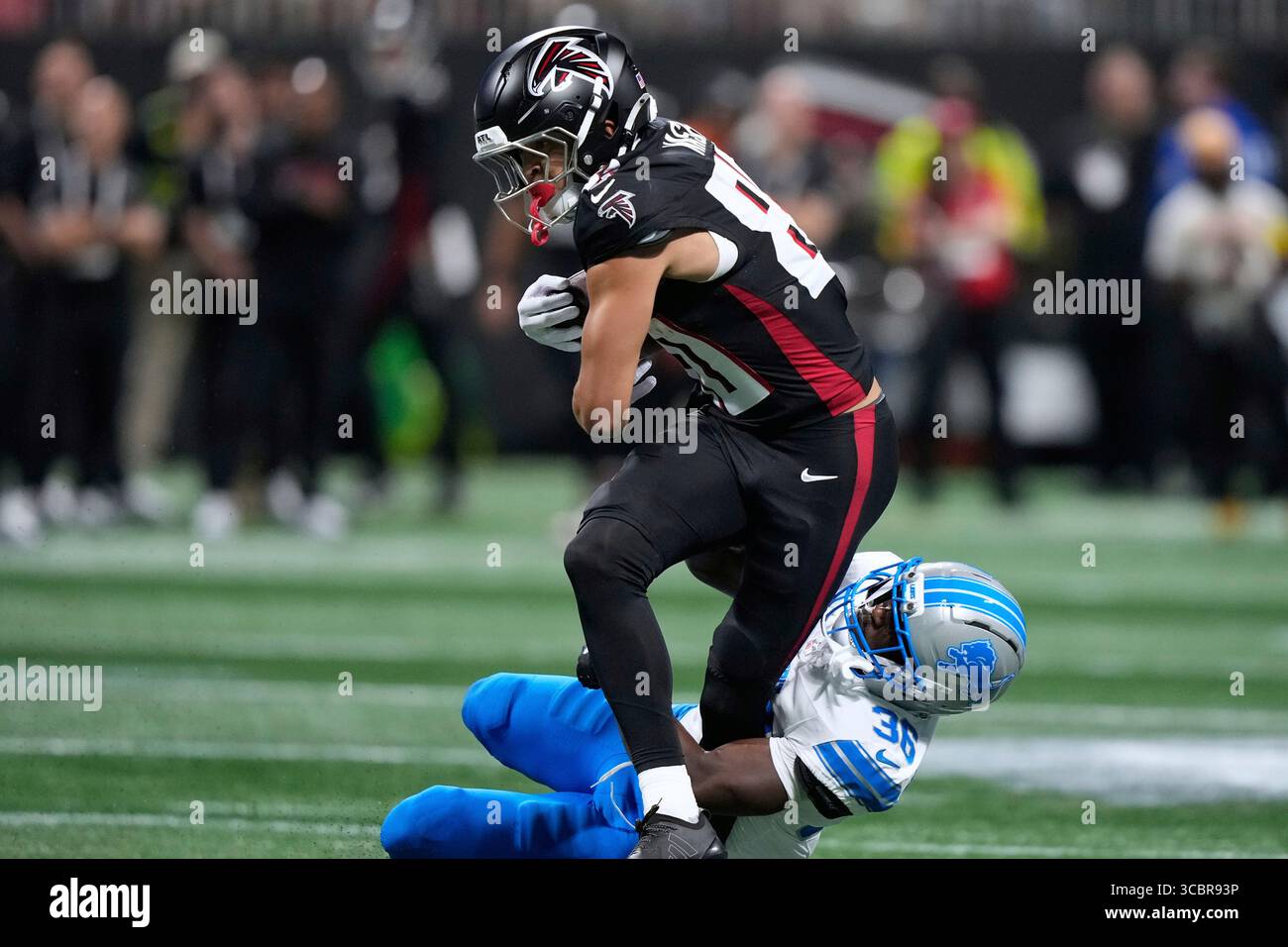 Detroit Lions safety Erick Hallett (36) tackles Atlanta Falcons wide ...