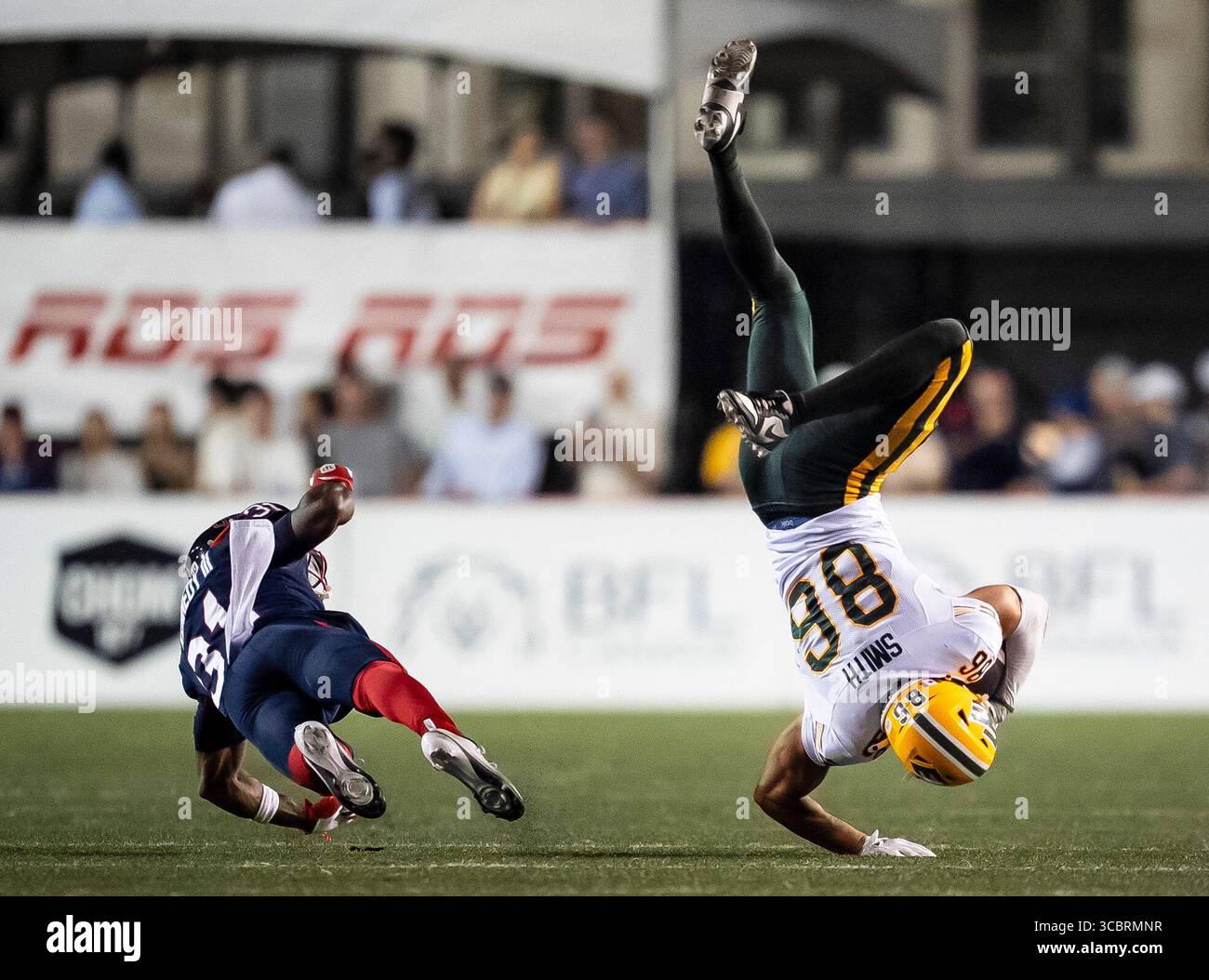 Arkell Smith Montreal Alouettes' Keanu Yazbeck (31) hits Edmonton Elks' Arkell Smith ...