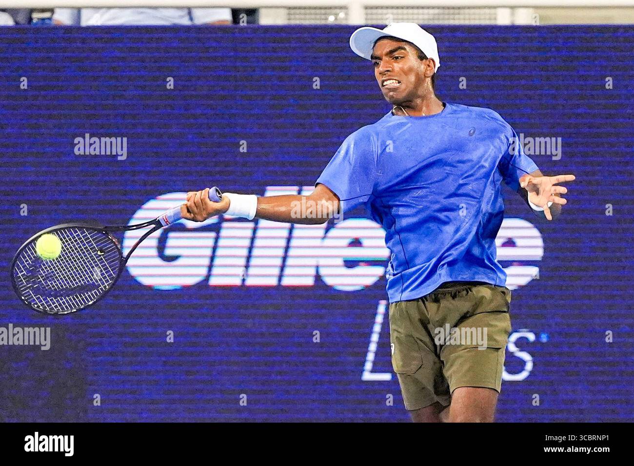 MASON, OH - AUG 8: Nishesh Basavareddy (USA) returns a shot to Aleksandar Vukic (not pictured) during the first round of mens singles at the 2025 Cincinnati Open at Lindner Family Tennis Center on August 8, 2025. Stock Photo
