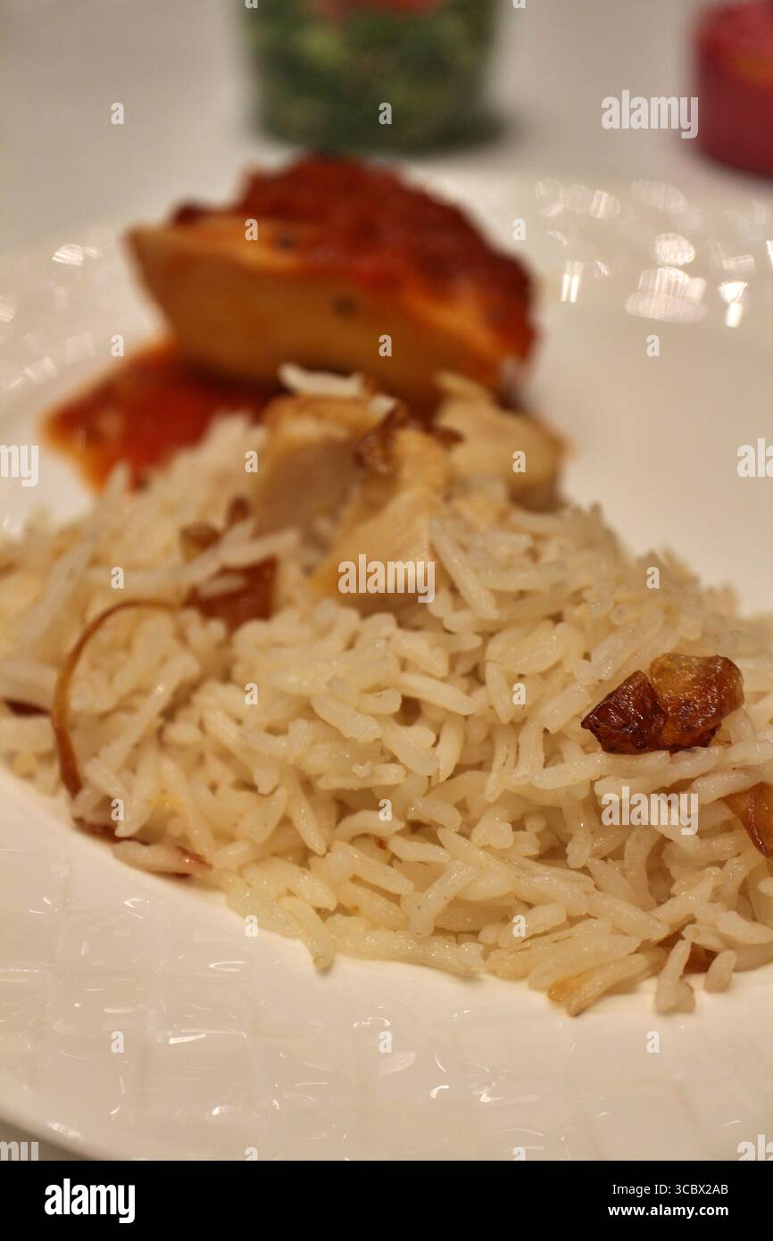 Iranian cuisine: chicken pilaf rice in Doha, Qatar Stock Photo