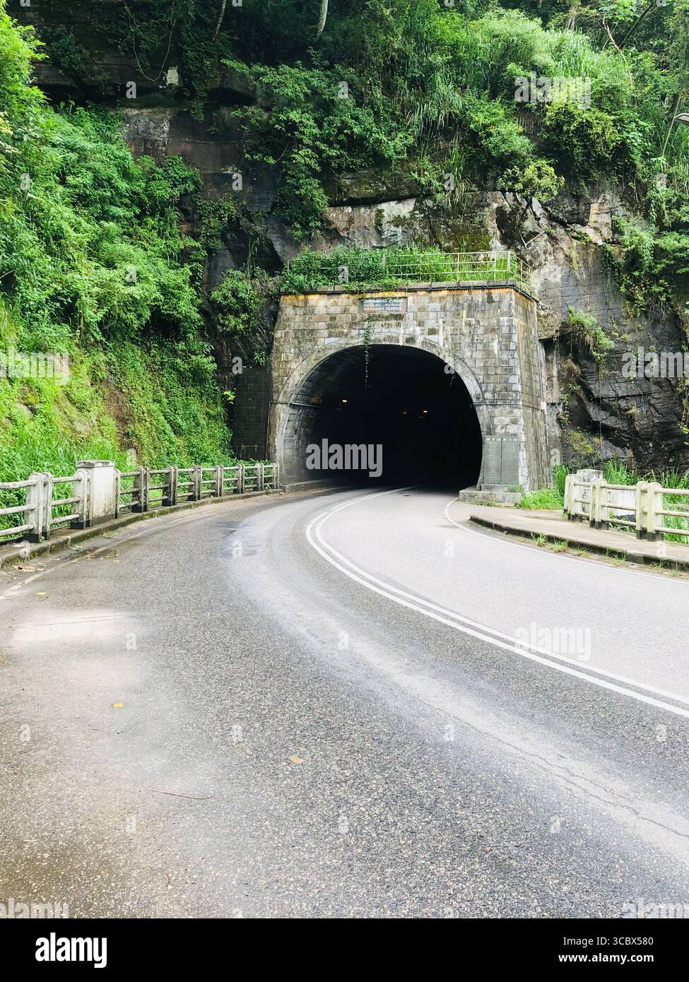 Ramboda Tunnel, the longest road tunnel in Sri Lanka, is nestled in the lush hills of Central Province, near Ramboda Falls. Opened in 2008. - Smartphone Captured Stock Image