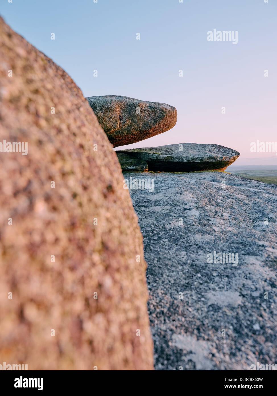 Exposed granite rock formation at dusk on Stowes Hill tor, Minions, Bodmin Moor, Cornwall England UK Stock Photo