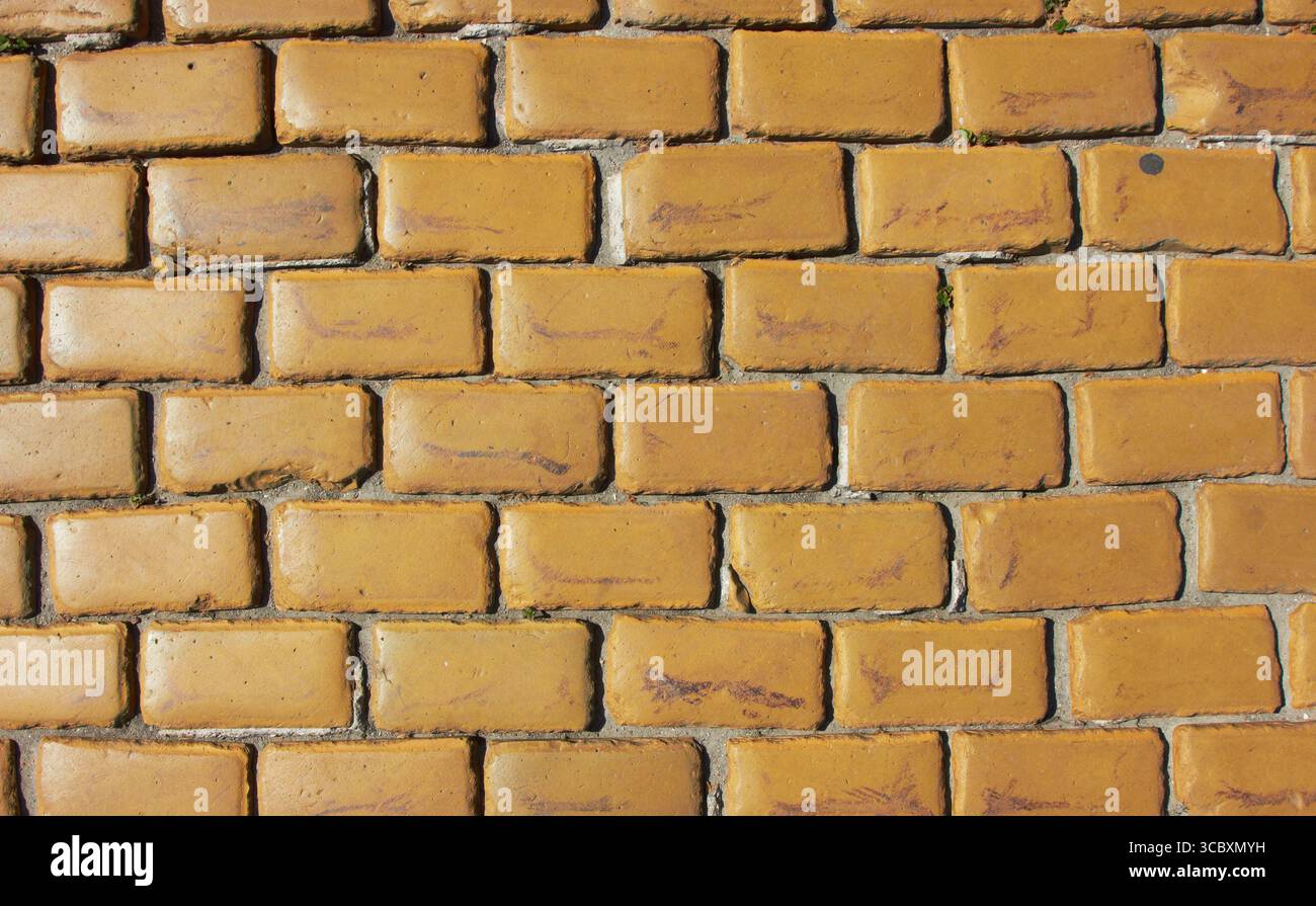 Old wall made from yellow bricks texture Stock Photo