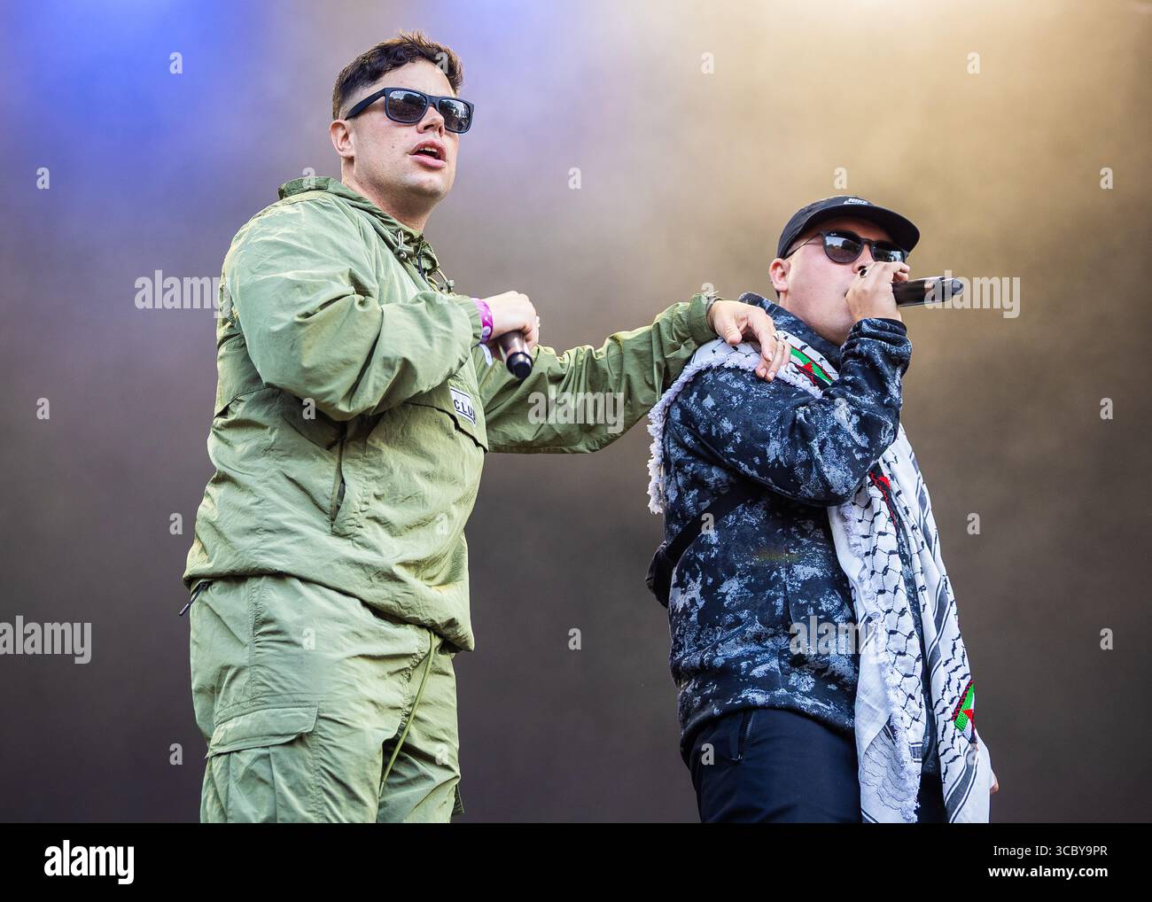 Mo Chara and Móglaí Bap of Kneecap performing live in August 2025 Stock Photo