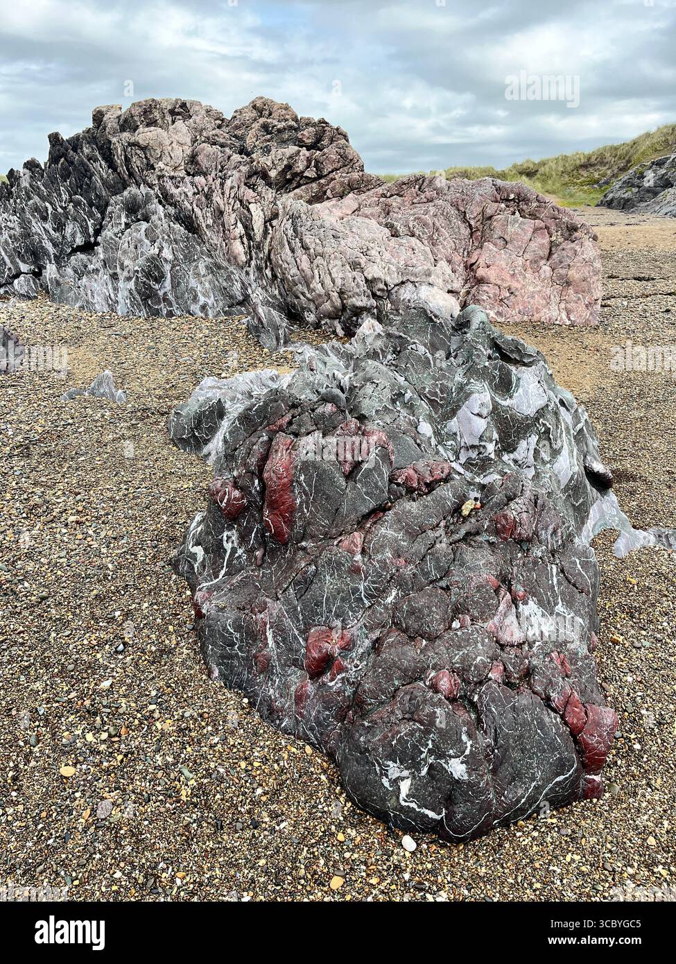 Cambrian Mélange rock formation on Porth Twr Bach on Llanddwyn island off Anglesey. UK - Smartphone Captured Stock Image