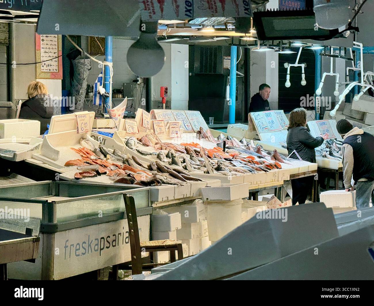 Fresh seafood on display at a traditional fish market in Athens, Greece. - Smartphone Captured Stock Image