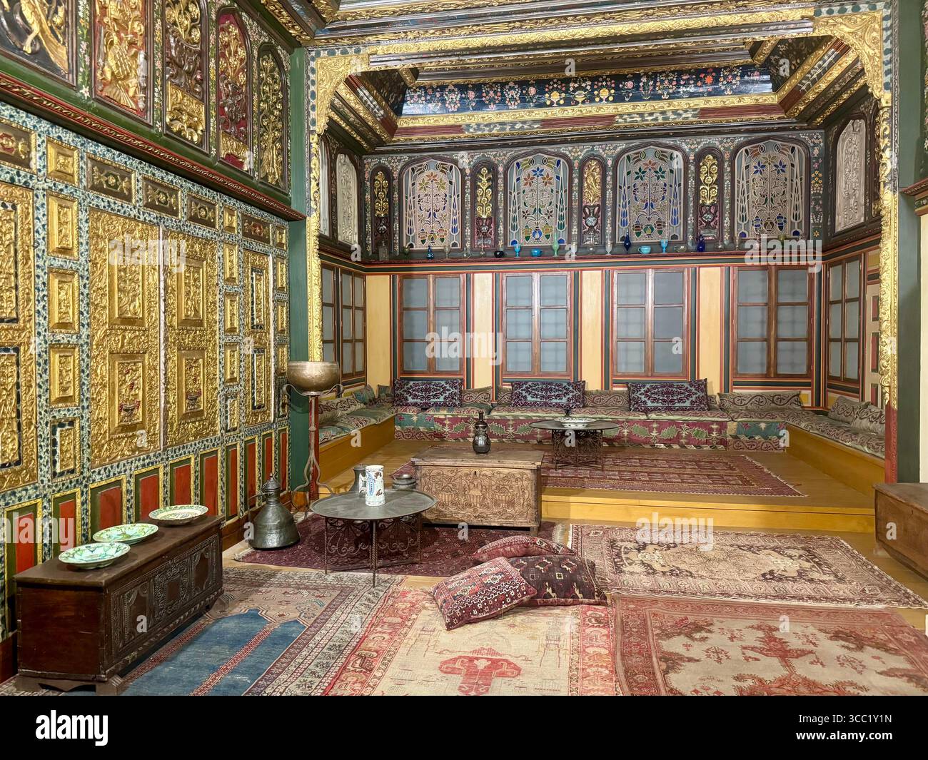 Interior views of a traditional ornately decorated room at Benaki Museum in Athens, showcasing historic Greek cultural heritage and craftsmanship. - Smartphone Captured Stock Image