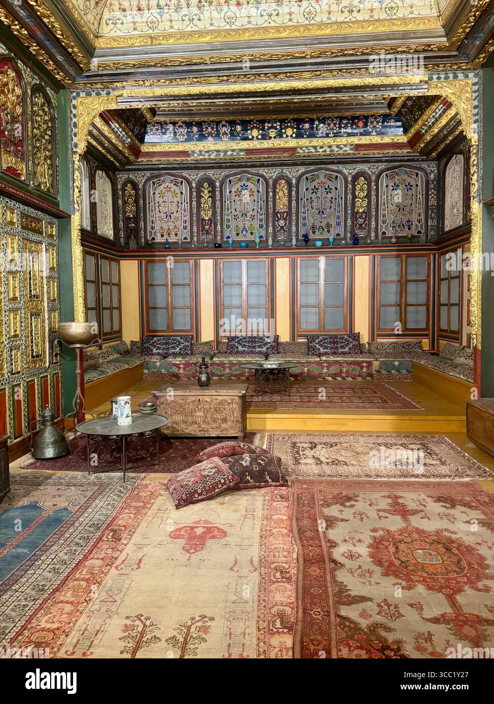 Interior views of a traditional ornately decorated room at Benaki Museum in Athens, showcasing historic Greek cultural heritage and craftsmanship. - Smartphone Captured Stock Image