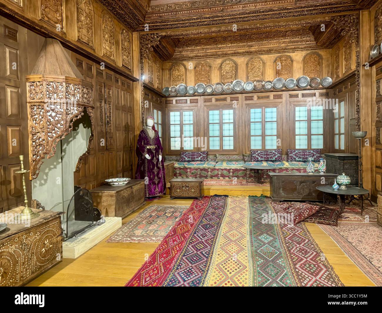 Interior views of a traditional ornately decorated room at Benaki Museum in Athens, showcasing historic Greek cultural heritage and craftsmanship. - Smartphone Captured Stock Image