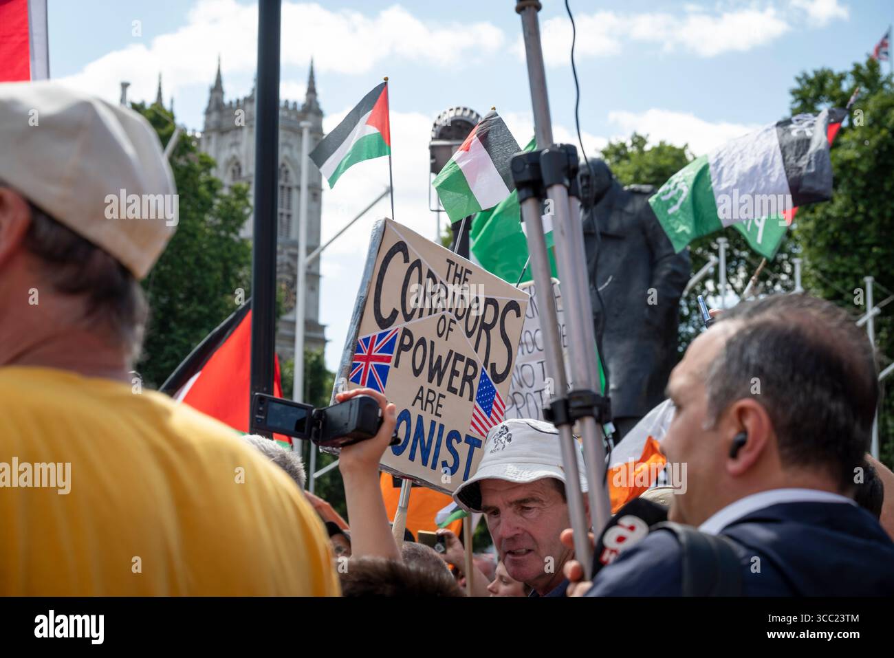 'The corridors of power are Zionist' placard at Palestine Action protest at Parliament Square, London, England, UK, 09/08/2025 Stock Photo