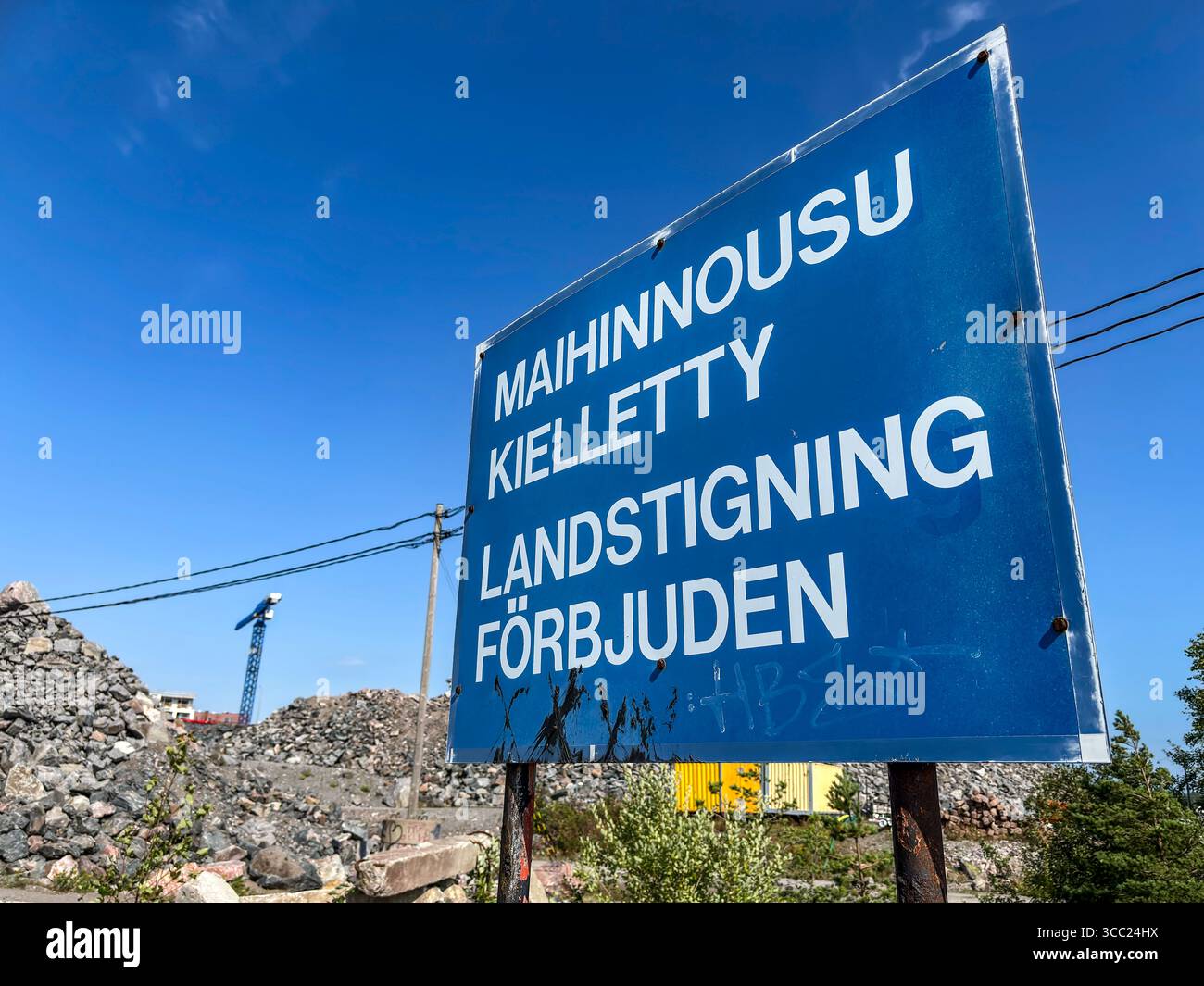 No-landing sign in Kruunuvuorenranta. In the background, a construction site. - Smartphone Captured Stock Image