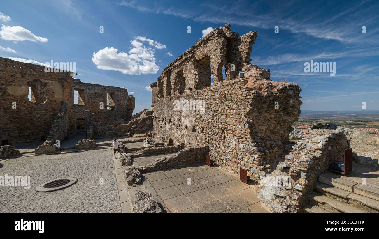 Tourist exploring the ruins of Castelo Rodrigo's medieval castle ...